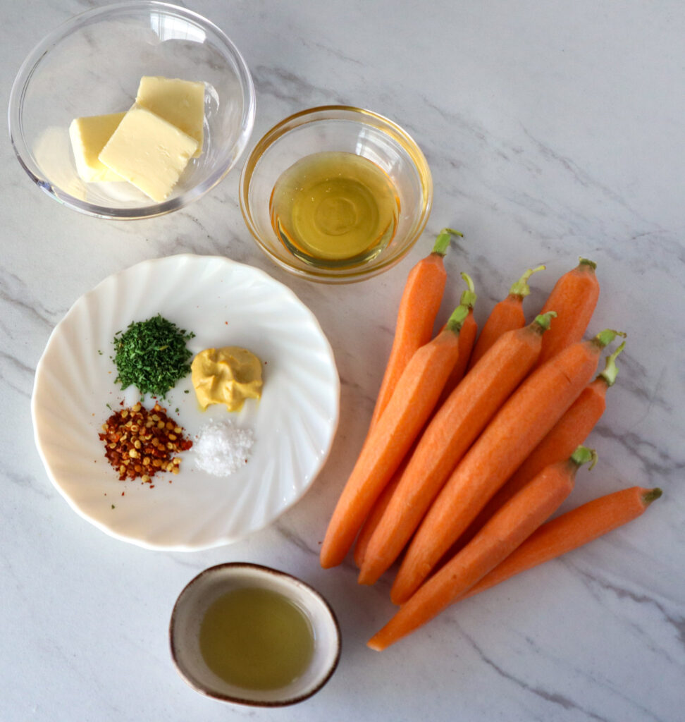 Ingredients required to make honey-roasted carrots
