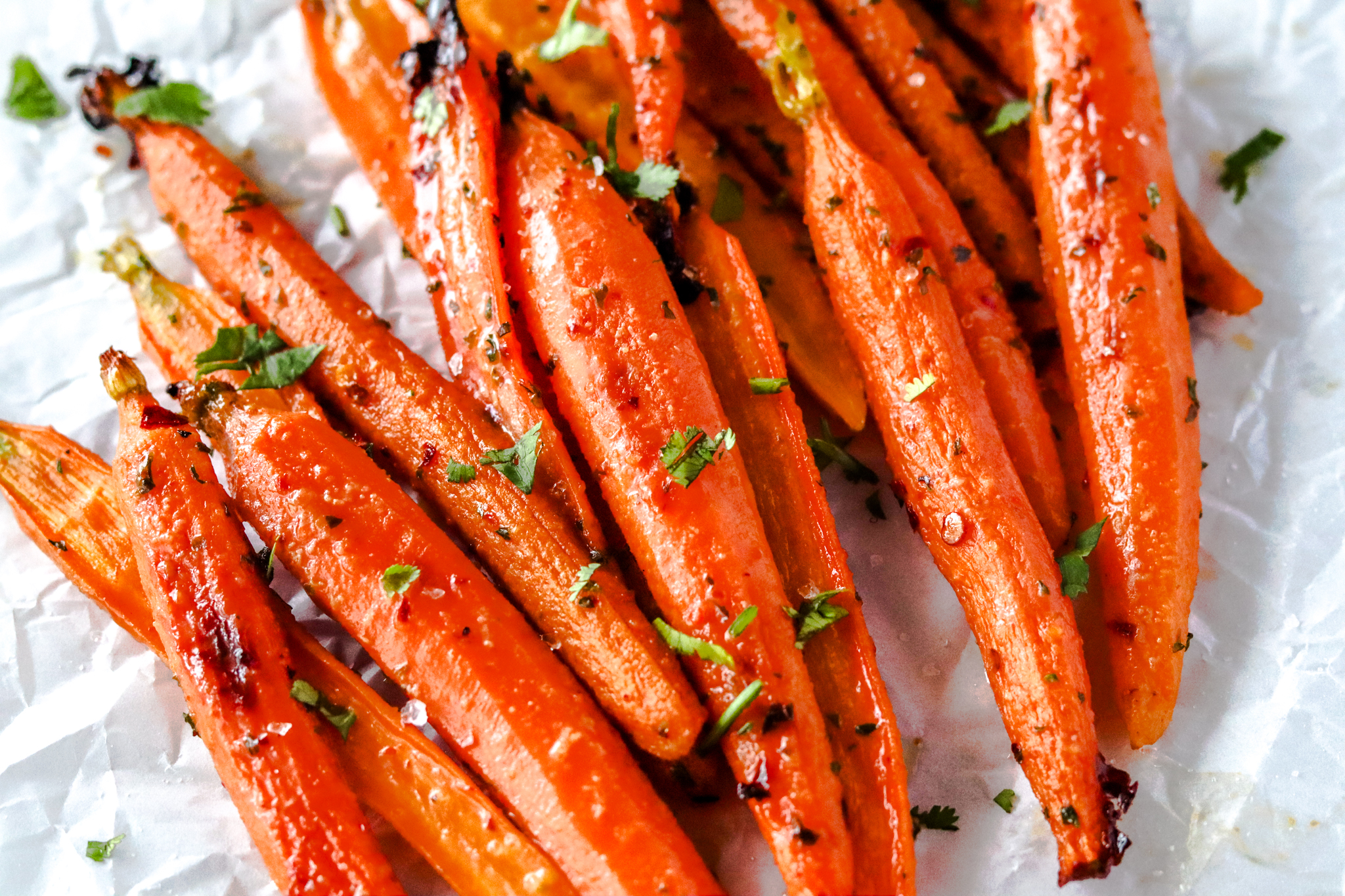 Carrots coated in a honey and maple butter mixture 