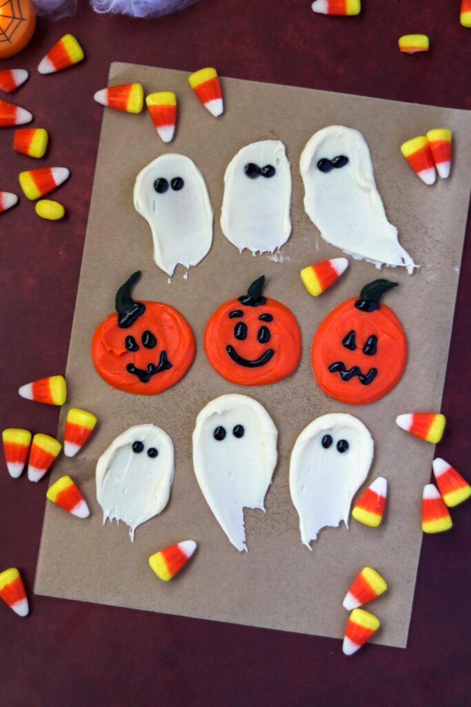 chocolate pumpkin and ghosts drying on parchment 