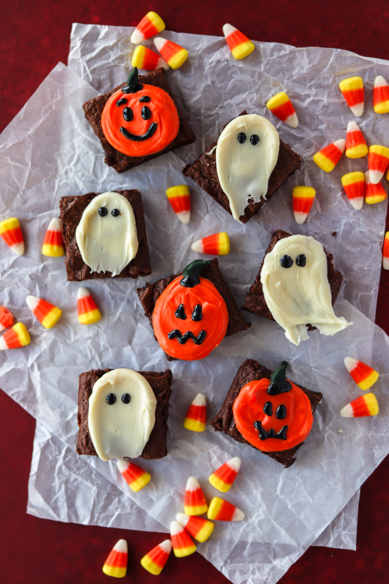 Brownies topped with white chocolate ghosts and pumpkins 