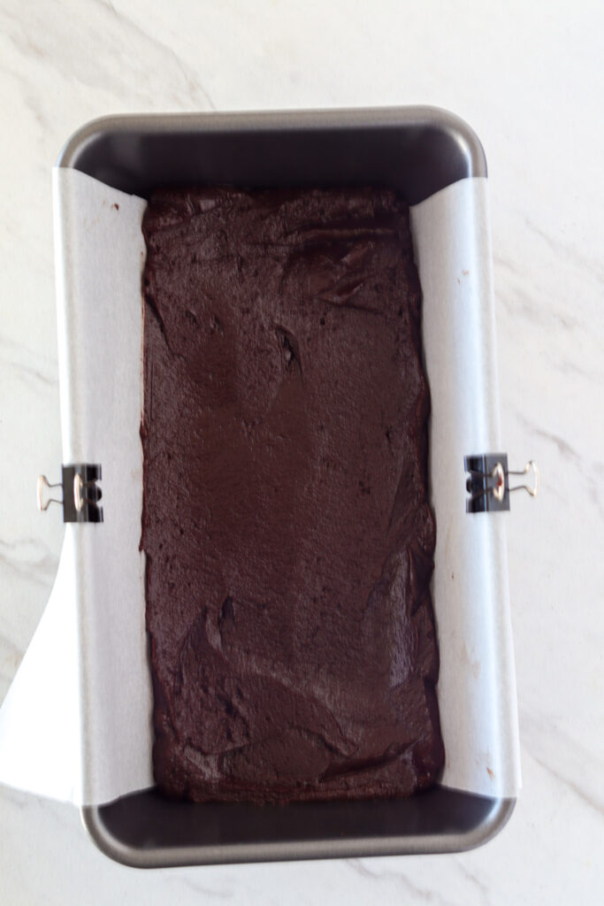 Brownie batter in a loaf pan