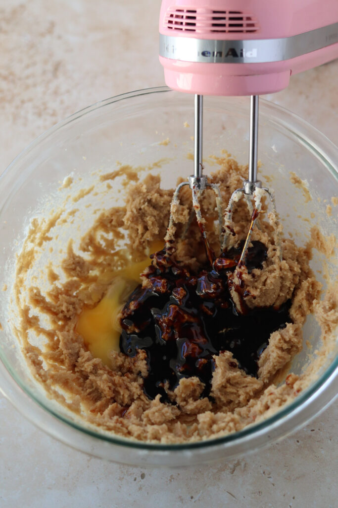 Molasses, egg and vanilla  added to the butter and sugar mixture