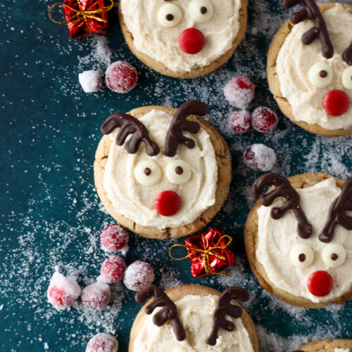 Brown butter cookies that are topped with maple brown butter frosting, chocolate antlers, red smartie and chocolate eyes