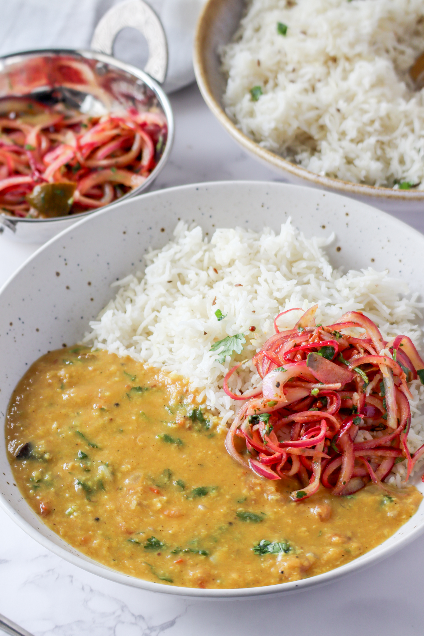 Instant Pot Moong Dal with jeera rice and pickled onions

